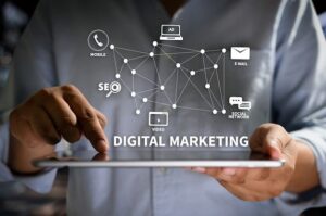 What is digital marketing concept showing SEO, social media, email marketing, and online advertising on a digital tablet.
